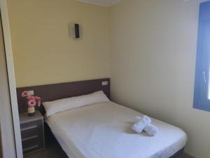 Postel nebo postele na pokoji v ubytování Albergue rural l'Almada de Yebra