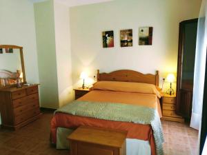Postel nebo postele na pokoji v ubytování Casa Rural Almécija