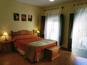 Postel nebo postele na pokoji v ubytování Casa Rural Almécija