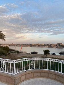 a view of the water from a balcony at Nile palace villa in Luxor