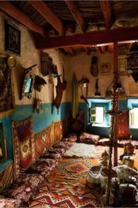 Гостиная зона в La Maison Traditionnelle Hôtel et guesthouse