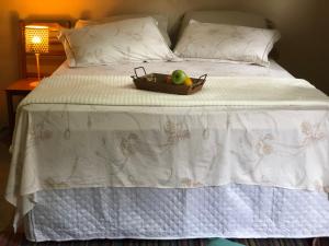 Postel nebo postele na pokoji v ubytování Pousada Camping e Restaurante Vila dos Arcanjos