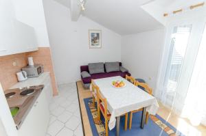 Kuchyň nebo kuchyňský kout v ubytování Apartments Zoran