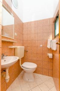 Koupelna v ubytování Apartments Zoran