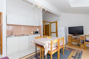 Kuchyň nebo kuchyňský kout v ubytování Apartments Zoran