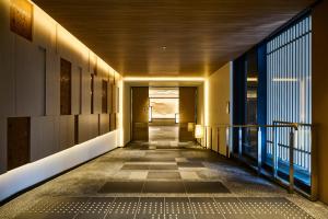 a hallway of a building with a hallwayngth at The Royal Park Hotel Kyoto Umekoji in Kyoto