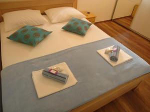 מיטה או מיטות בחדר ב-Guesthouse Lisica