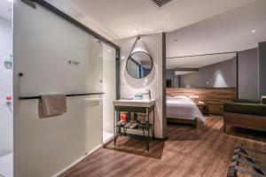 Katil atau katil-katil dalam bilik di 有集城市客栈锦绣中华店Unijoy Cityinn Splendid China Shenzhen