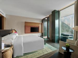 En eller flere senger på et rom på Banyan Tree Nanjing Garden Expo