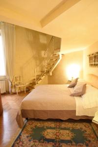 Posteľ alebo postele v izbe v ubytovaní Italian Experience-Suite Medici