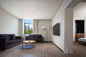 Istumisnurk majutusasutuses Unijoy Cityinn OCT Loft Shenzhen有集城市客栈创意园店