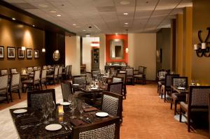 
a dinning room with tables, chairs, and tables at Arizona Charlie's Decatur in Las Vegas
