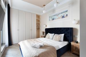 Posteľ alebo postele v izbe v ubytovaní Elite Apartments Granaria The View