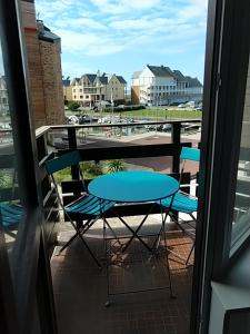 Balkon oz. terasa v nastanitvi Studio Deauville-Les Marinas,vue mer et bassin