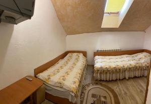 Postel nebo postele na pokoji v ubytování Атлант + 30 fotografií