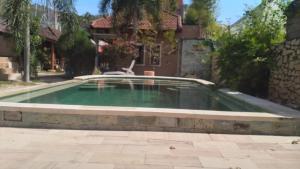 Bazén v ubytování Kutabay Homestay nebo v jeho okolí