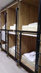 a group of bunk beds in a room at Hostel Rus Aviator in Moscow
