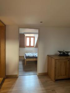 a bedroom with a bed and a window in a room at Annecy Sainte Claire DUPLEX Gare-Lac 4e étage 4ou6 personnes in Annecy +25 photos