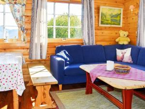 Гостиная зона в Holiday home SANDANE