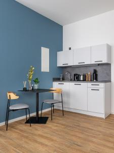 Η κουζίνα ή μικρή κουζίνα στο Limehome Augsburg Annastraße