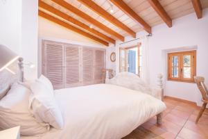 Postel nebo postele na pokoji v ubytování Townhouse Can Neri by SunVillas Mallorca