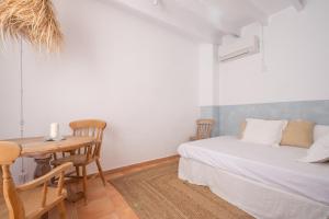 Postel nebo postele na pokoji v ubytování Townhouse Can Neri by SunVillas Mallorca