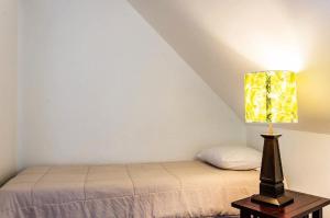 Letto o letti in una camera di Village Sainte Luce - maeva Home