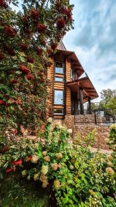 a brick house with a window on the side of it at Spa Resort Kedroviy in Belokurikha