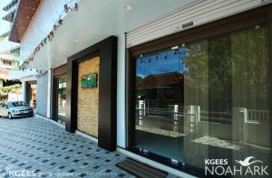 a window of a store with a car in it at Kgees Noah Ark in Thodupuzha