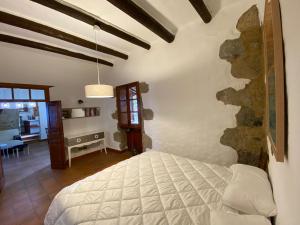 Cama o camas de una habitación en Casa Rural El Drago