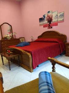 Łóżko lub łóżka w pokoju w obiekcie Nonno Ciccio Apartment