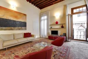 Posezení v ubytování Ca’ Amalia San Marco Venetian Apartment M027042932