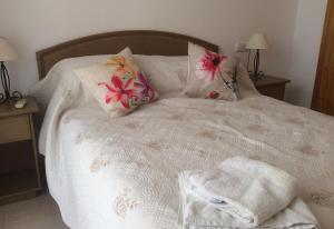 Posteľ alebo postele v izbe v ubytovaní Homely Apartment in El Faro