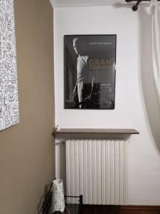 een foto van een poster op een muur met een radiator bij Gran Torino in Turijn