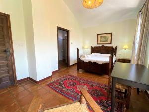 Łóżko lub łóżka w pokoju w obiekcie Villa Casa Alta