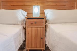 A bed or beds in a room at Villa Can Tomeu