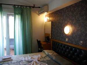 Posteľ alebo postele v izbe v ubytovaní Blue Sky Villas