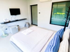 Postel nebo postele na pokoji v ubytování The Seacret Kohlarn