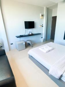 Una cama o camas en una habitación de The Seacret Kohlarn