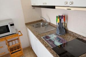 A kitchen or kitchenette at Balcón de Amadores 1