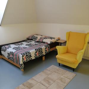 A bed or beds in a room at Hos Agnes sp z oo