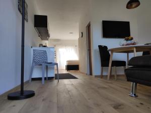 A television and/or entertainment centre at Apartment Hagen