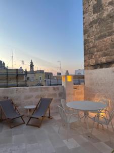 A balcony or terrace at Palazzo Manzoni by MANZONI COLLECTION