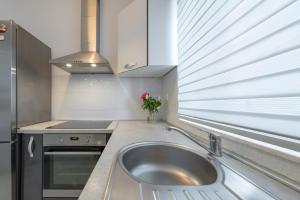 Kuchyň nebo kuchyňský kout v ubytování Apartmani Zaja