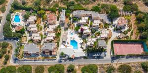 an aerial view of a house with a pool at Ida Village I & II in Hersonissos