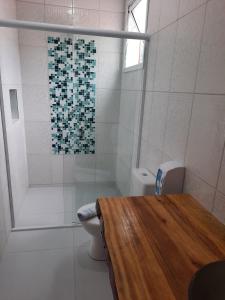 Vonios kambarys apgyvendinimo įstaigoje Suítes Praia Barequeçaba