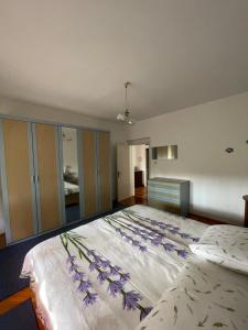 Postel nebo postele na pokoji v ubytování Apartmani Pavat + 31 fotografií