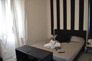 Postel nebo postele na pokoji v ubytování Hotel Butterfly