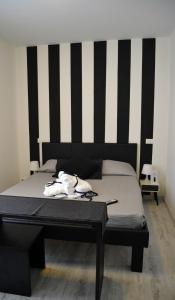 Postel nebo postele na pokoji v ubytování Hotel Butterfly