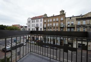 a view of a city street from a balcony at Dodo Acomodo 5 in Katowice